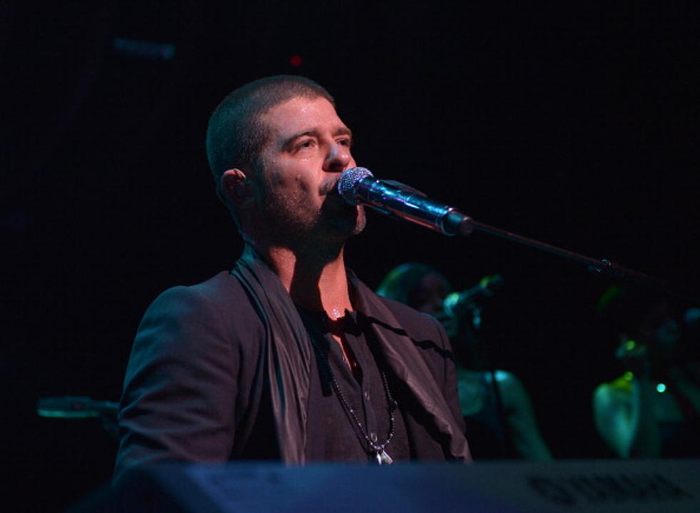 Is Robin Thicke Trying Too Hard To Get Her Back?